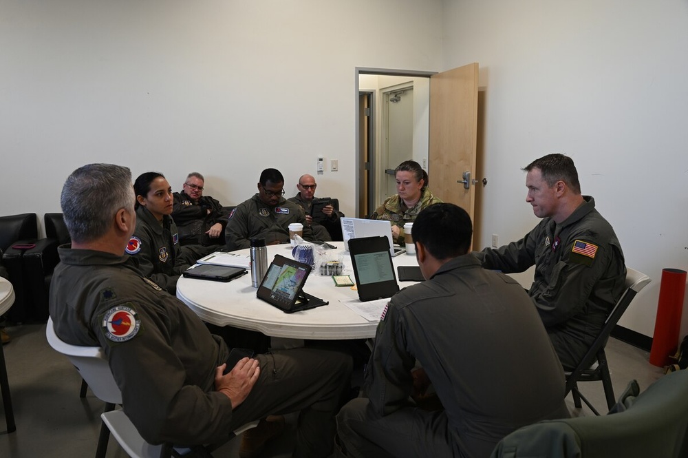 Weathering the Distance: Operational Weather Flights Team Up for Mission Success