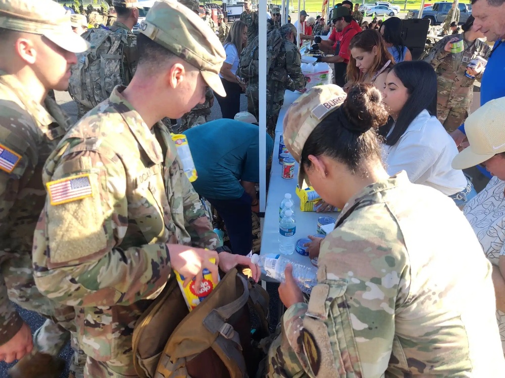 Fort Buchanan Remembers the 9/11 attacks with a road march and donating food to the island's disadvantaged