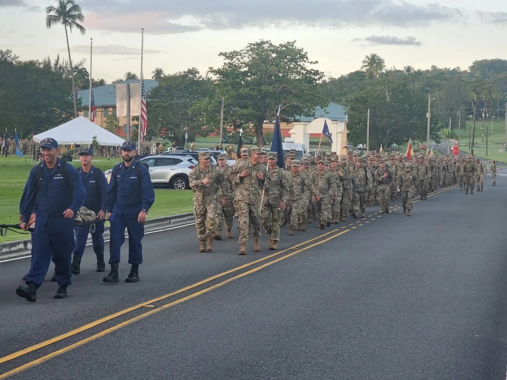 Fort Buchanan Remembers the 9/11 attacks with a road march and donating food to the island's disadvantaged