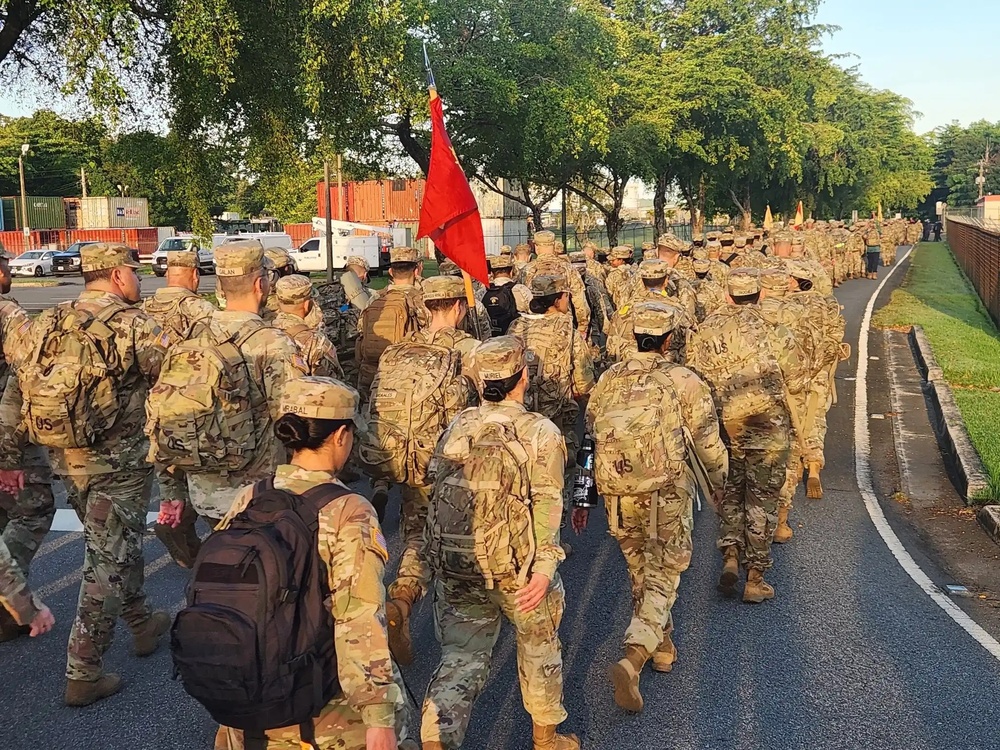 Fort Buchanan Remembers the 9/11 attacks with a road march and donating food to the island's disadvantaged