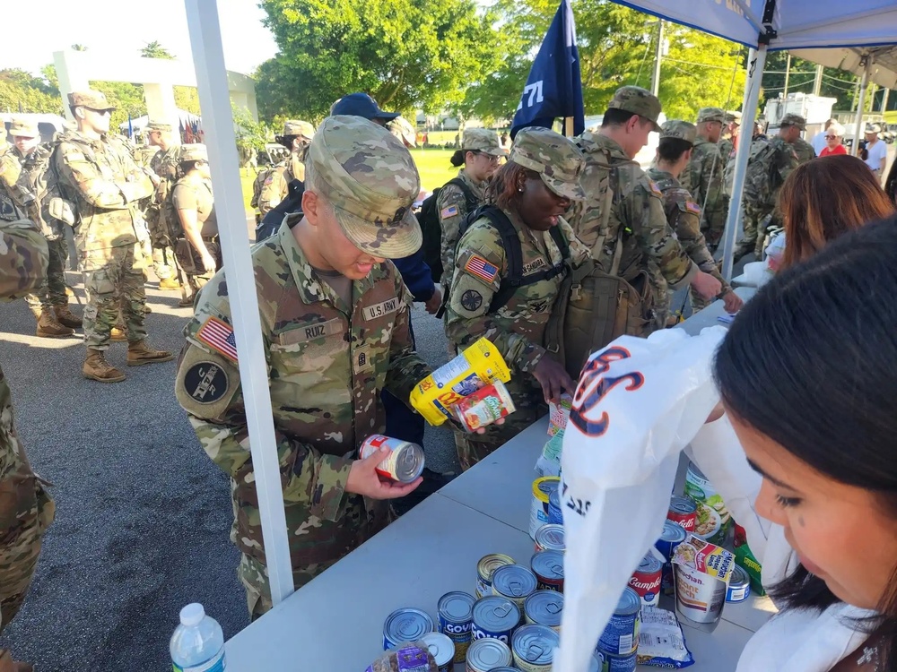 Fort Buchanan Remembers the 9/11 attacks with a road march and donating food to the island's disadvantaged