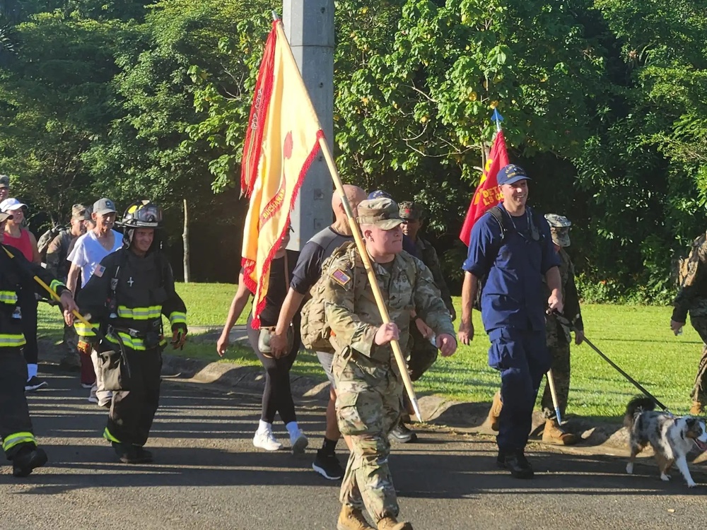 Fort Buchanan Remembers the 9/11 attacks with a road march and donating food to the island's disadvantaged