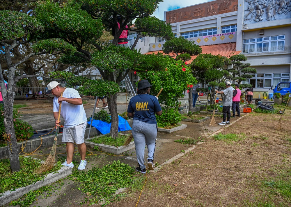 U.S. service members beautify Okinawan school grounds during volunteer project