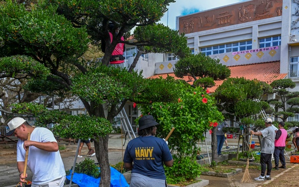 U.S. service members beautify Okinawan school grounds during volunteer project