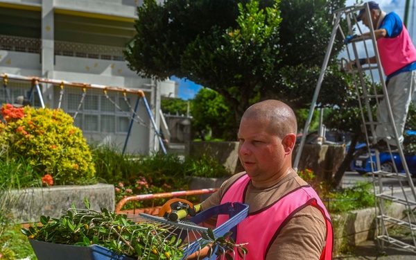 U.S. service members beautify Okinawan school grounds during volunteer project