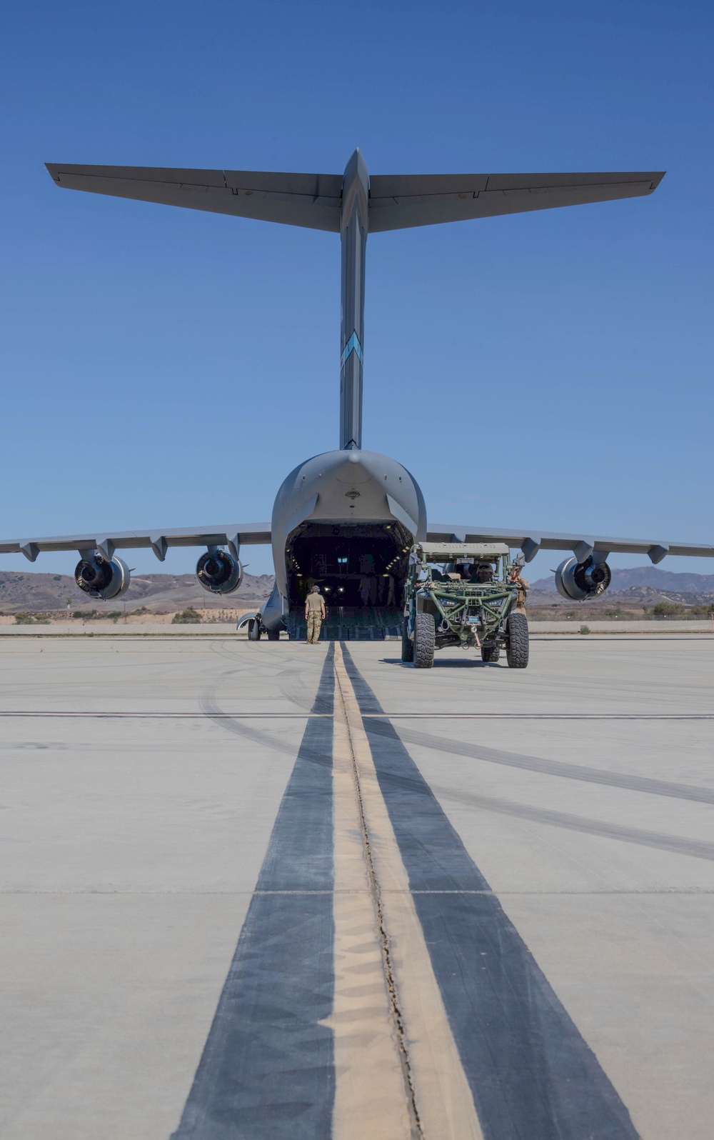 1st Bn., 11th Marines load HIMARS onto U.S. Airforce C-17 Globemaster III
