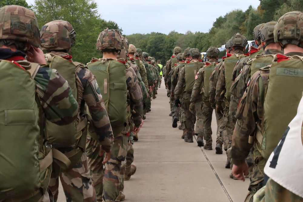 Allied Forces March Along Road to Prepare for Falcon Leap Airborne Operations