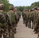 Allied Forces March Along Road to Prepare for Falcon Leap Airborne Operations