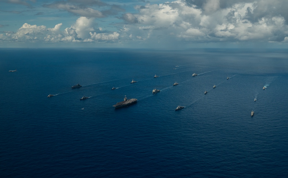 U.S., Allied, and Partner ships steam in formation