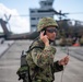 U.S. Marines, Sailors, Japan Ground Self-Defense Force members refuel AH-64 Apaches with MV-22B Ospreys
