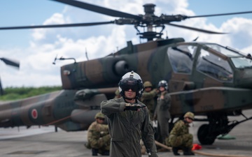 U.S. Marines, Sailors, Japan Ground Self-Defense Force members refuel AH-64 Apaches with MV-22B Ospreys