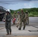 U.S. Marines, Sailors, Japan Ground Self-Defense Force members refuel AH-64 Apaches with MV-22B Ospreys