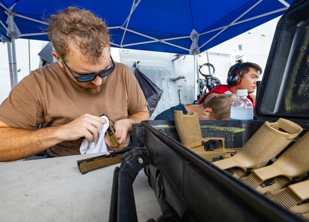 USS Dewey qualify Sailors in Small Arms Weapons