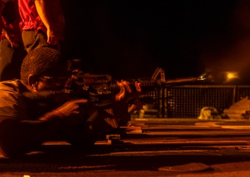 USS Dewey qualify Sailors in Small Arms Weapons