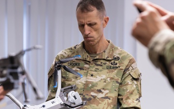 Brig. Gen. Crooks Visits JMTG-U UAV Innovation Team at Balli Airlfield