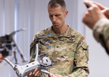 Brig. Gen. Crooks Visits JMTG-U UAV Innovation Team at Balli Airlfield