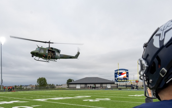 Gameball flies; Minot AFB brings airpower to Minot North Highschool kickoff