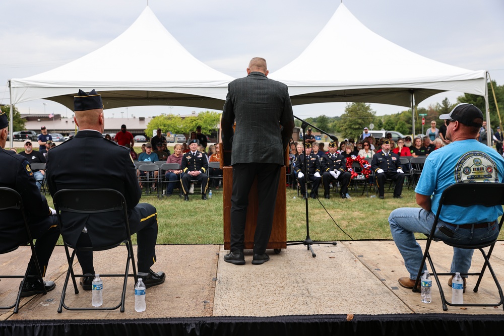 Guest speaker addresses attendees at Wall of Remembrance Ceremony in Solon, Iowa