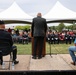 Guest speaker addresses attendees at Wall of Remembrance Ceremony in Solon, Iowa