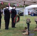American Legion members place wreath and salute at Wall of Remembrance ceremony in Solon, Iowa