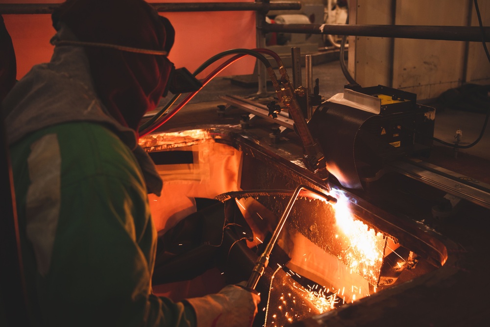 USS Ronald Reagan (CVN 76) Sailor Stands a Fire Watch as the Shipyard Works