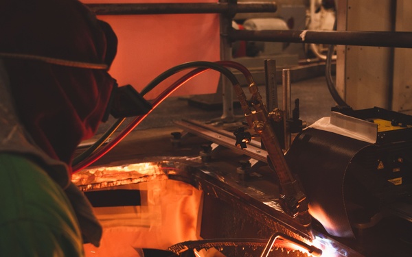 USS Ronald Reagan (CVN 76) Sailor Stands a Fire Watch as the Shipyard Works