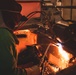 USS Ronald Reagan (CVN 76) Sailor Stands a Fire Watch as the Shipyard Works