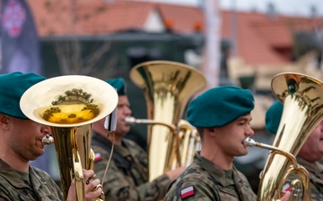 Polish military band performs during NATO transfer of authority