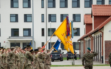 U.S. Soldiers render honors during Polish led troop inspection
