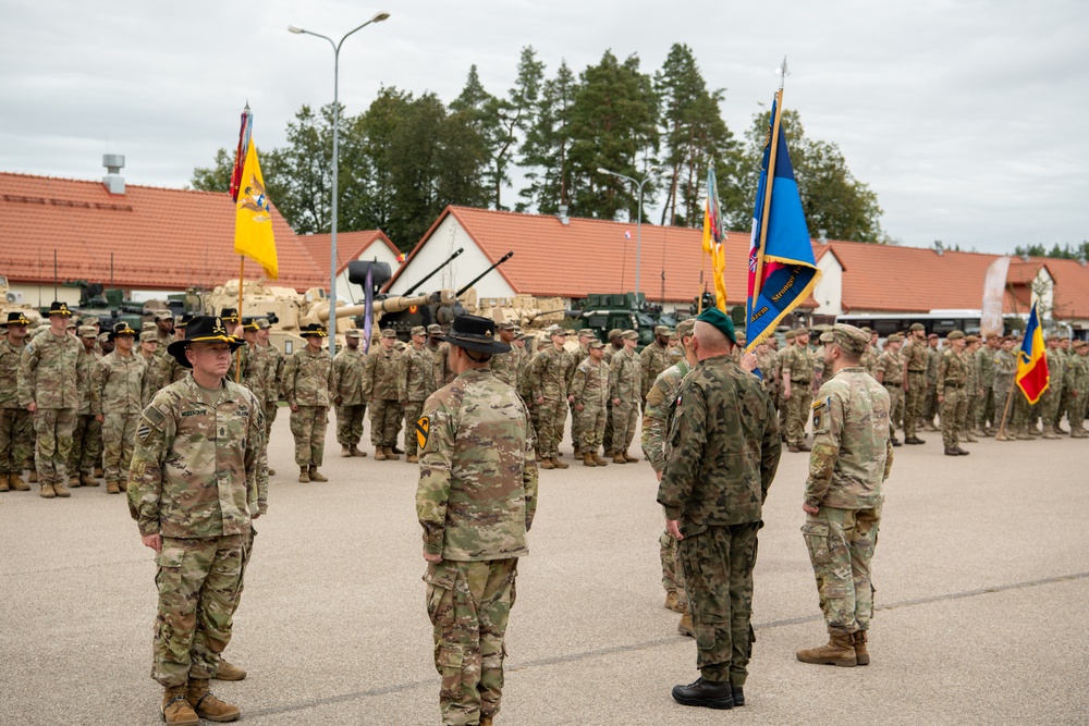 U.S. and Polish leaders conduct change of colors during Battlegroup transfer of authority