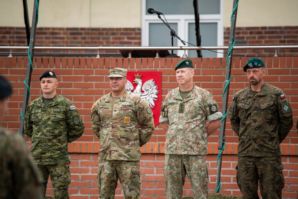 U.S. senior national representative stands with Allied leaders in Poland