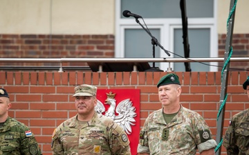 U.S. senior national representative stands with Allied leaders in Poland