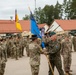 U.S. and Polish leaders conduct change of colors during NATO transfer of authority