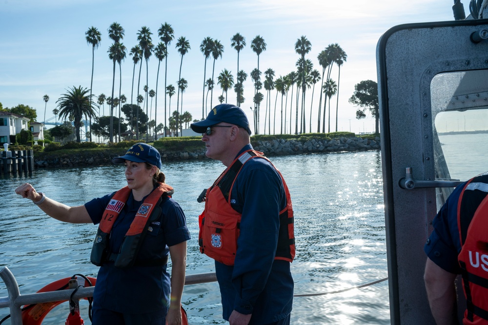 Rear Adm. Jeffrey Novak visits Coast Guard Station Los Angeles-Long Beach and the Incident Command Post for the Pier G container incident at the Port of Long Beach