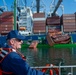 Rear Adm. Jeffrey Novak visits Coast Guard Station Los Angeles-Long Beach and the Incident Command Post for the Pier G container incident at the Port of Long Beach