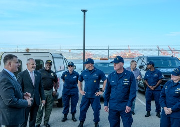 Rear Adm. Jeffrey Novak visits Coast Guard Station Los Angeles-Long Beach and the Incident Command Post for the Pier G container incident at the Port of Long Beach