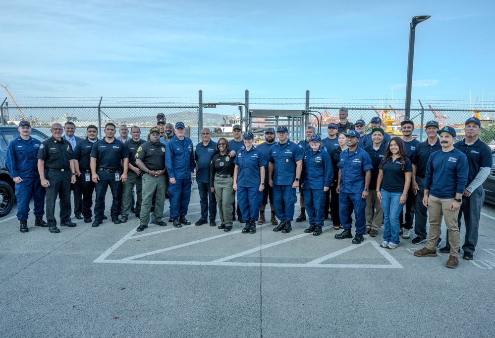 Rear Adm. Jeffrey Novak visits Coast Guard Station Los Angeles-Long Beach and the Incident Command Post for the Pier G container incident at the Port of Long Beach