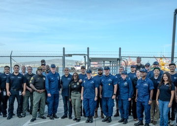 Rear Adm. Jeffrey Novak visits Coast Guard Station Los Angeles-Long Beach and the Incident Command Post for the Pier G container incident at the Port of Long Beach