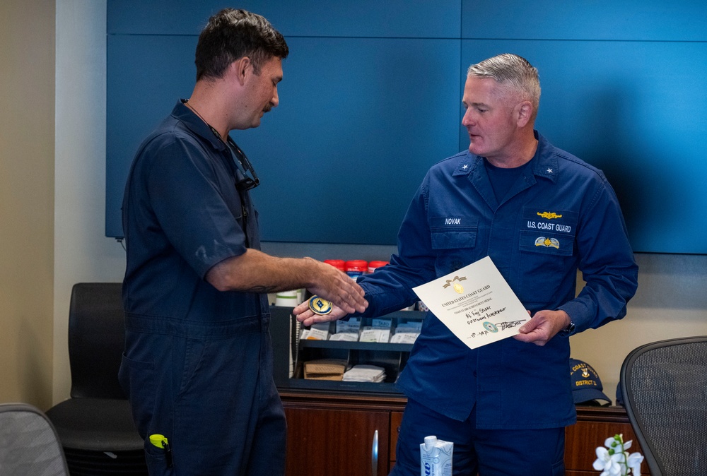 Rear Adm. Jeffrey Novak visits Coast Guard Station Los Angeles-Long Beach and the Incident Command Post for the Pier G container incident at the Port of Long Beach