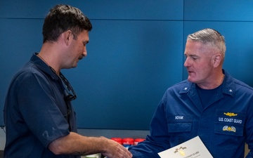 Rear Adm. Jeffrey Novak visits Coast Guard Station Los Angeles-Long Beach and the Incident Command Post for the Pier G container incident at the Port of Long Beach