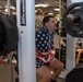Sailors participate in Morale, Welfare and Recreation weight lifting competition.