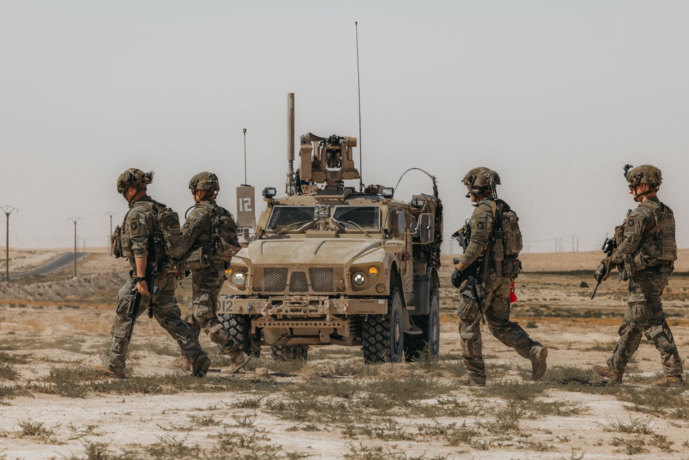 Iowa National Guard Soldiers secure a landing zone