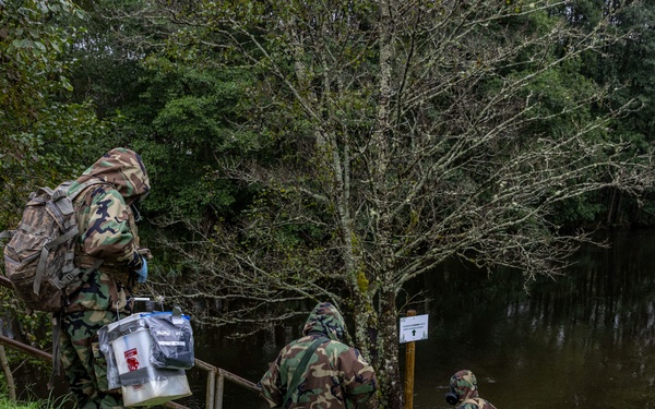 U.S. Army Soldiers conduct reconnaissance in an underpass