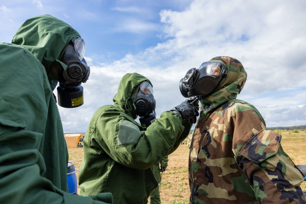 U.S. Army Soldier gets decontaminated at Engineer Thunder 2025