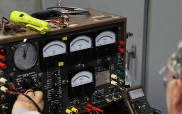Radford Army Ammunition Plant employee checking energy levels in the powerhouse.