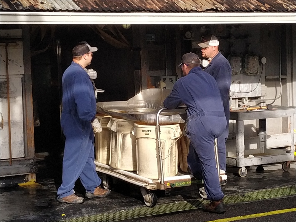 Employees at Radford Army Ammunition Plant replenishing supplies needed for propellant production