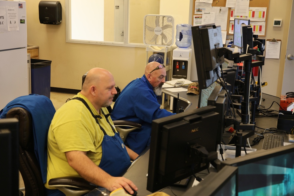 Employee in NAC/SAC control room at Radford Army Ammunition Plant.