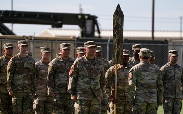 46th Chemical Company cases unit colors during inactivation ceremony on Fort Bliss