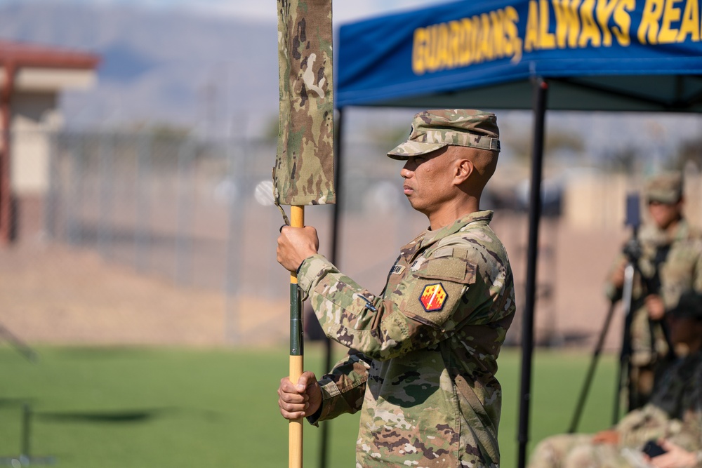 46th Chemical Company cases unit colors during inactivation ceremony on Fort Bliss