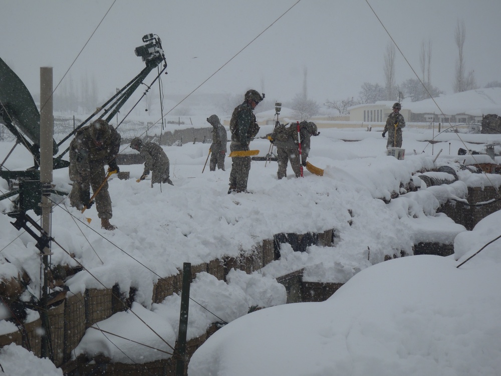 Soldiers clearing snow